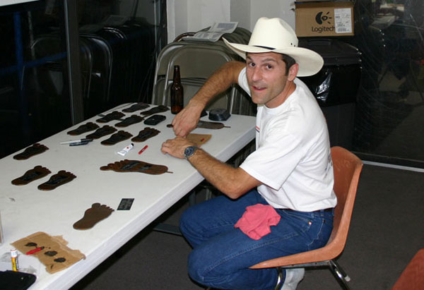 Chuck Stovall Jr. assembling trophies